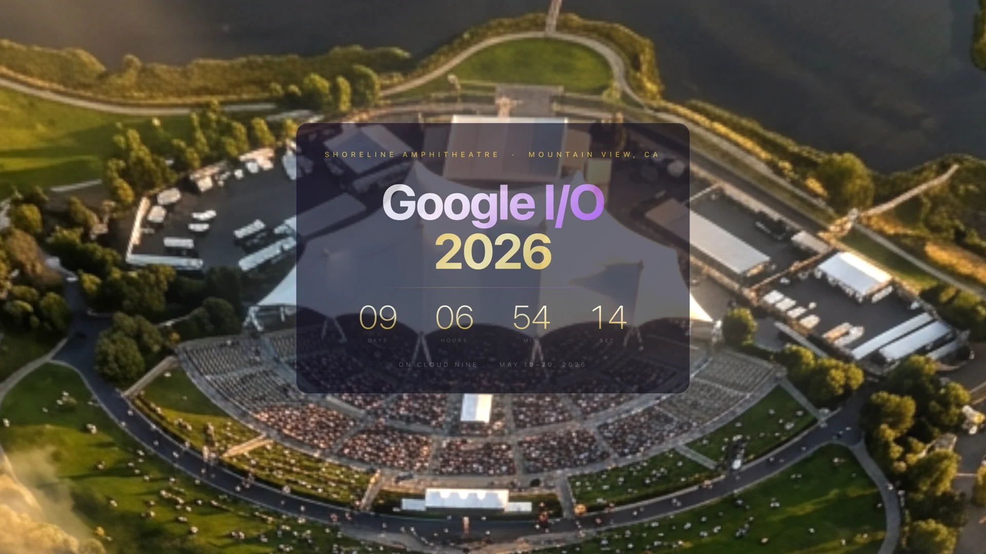 Shoreline reveal at 100% scroll showing aerial view of Shoreline Amphitheatre with Google I/O 2026 frosted countdown card