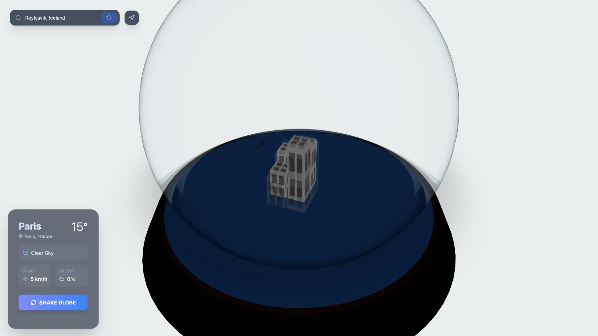 Interactive snow shake animation swirling precipitation particles inside the isometric glass dome
